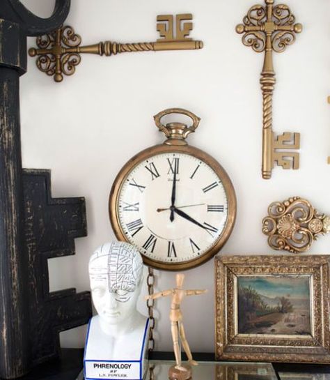 A Collage of Collectibles on Display Pocket Watch Wall, Watch Wall Clock, Watch Wall, Vintage Bedroom Decor, Vintage Home Accessories, Vintage Industrial Style, Vintage Room Decor, Country Living Magazine, Antique Keys