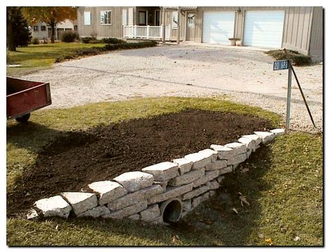 Fix that ugly culvert!  Wonder if our county would let me do this since they INSIST on mowing my Crown Vetch to the dirt every summer. (grrr!) Quick Crete Retaining Wall, Brick Culvert Driveway, Stone Culvert Driveway, Drain Ditch Landscaping, Ditches Landscaping, Ditch Retaining Wall, Driveway Ditch Ideas, Storm Drain Landscaping, Culvert Retaining Wall