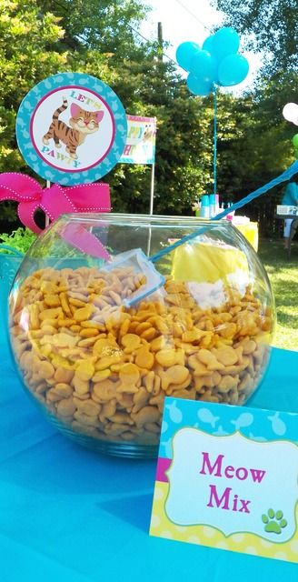 Goldfish meow mix at a Dog and Cat birthday party!  See more party ideas at CatchMyParty.com! Pet Shop Party Ideas Birthday, Pet Adoption Party Food, Puppies And Kitties Birthday Party, Pet Unleashed Vbs, Cat Themed Party Ideas, Cat Adoption Party Ideas, Dog And Cat Party Ideas, Cats And Dogs Birthday Party For Kids, Animal Shelter Birthday Party Ideas