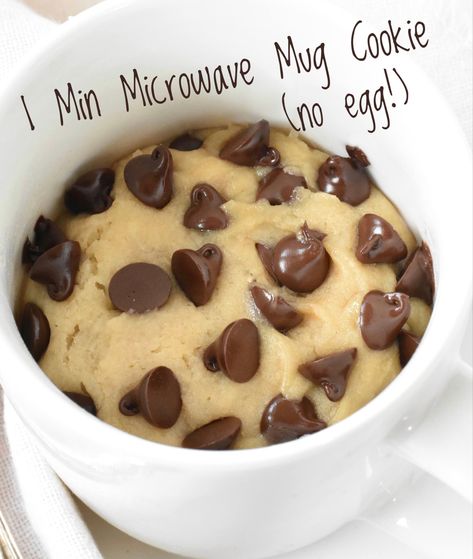 Satisfy your chocolate cravings with this amazing choc chip cookie in a mug! It only takes 1 minute to cook in the microwave. Microwave Cookie In A Cup No Egg, Mug Cookie Microwave No Egg, Chocolate Chip Cookie Mug Cake No Egg, Mug Cakes Chocolate Chip, Chocolate Chip Cookies Mug Cake, Chocolate Chip Cookie In A Cup, Easy Stuff To Bake At Home, Mug Cake Microwave Chocolate Chip, Mug Cookie No Egg