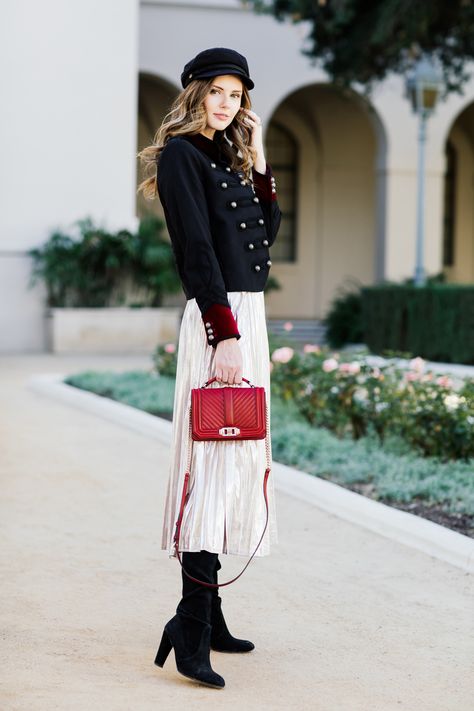 Military inspired. Military jacket, silver pleated skirt, red bag Black Military Jacket Outfit, Military Jacket Women Outfit, Baret Hat Outfit, Barbara Lightwood, Military Jacket Outfit, Military Jacket Outfits, Silver Pleated Skirt, Red Bag Outfit, Black Military Jacket