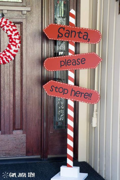 Want to learn how to make this cute DIY Santa Stop Here Sign? I repurposed fan blades to make mine but you can easily use 1x4 boards. Plus I made it all with scrap wood for a cute and easy Christmas craft to give your porch or front yard some new holiday decor on a budget. And Download the free SVG file to make your own. #girljustdiy Porch Projects, Santa Stop Here Sign, Easy Christmas Craft, Scrap Wood Crafts, Wooden Christmas Crafts, Diy Santa, Wood Craft Projects, Diy Valentine, Diy Outdoor Decor