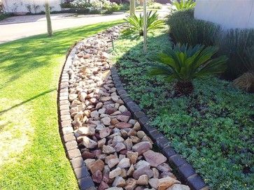 french drain landscape | French Drain Design Ideas, Pictures, Remodel, and Decor Backyard Drainage, Drainage Ditch, Yard Drainage, Lawn Design, French Drain, Drainage Solutions, Rain Garden, Landscaping With Rocks, Yard Ideas