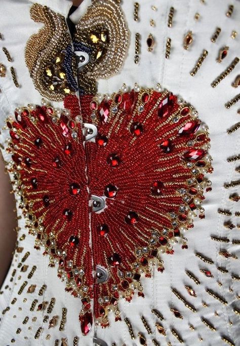 Sacred Heart Beaded, Sacred Heart Bead Embroidery, Sacred Heart Fashion, Sacred Heart Corset, Sacred Heart Dress, Corset With Beads, Heart Bead Embroidery, Hand Beaded Dress, Beaded Clothes Design