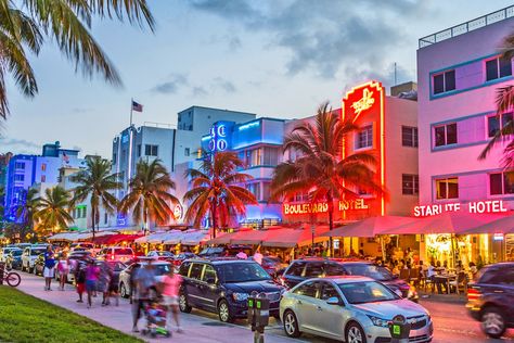 South Beach Ocean Drive, Miami Florida. people enjoy Palm trees and art deco hotels at Ocean Drive by night. The road is the main thoroughfare through South Beach in Miami, USA. Florida People, Miami Attractions, Miami Map, Ocean Drive Miami, Travel Miami, Miami Travel, South Beach Miami, Ocean Drive, Wroclaw