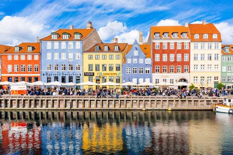 Multicolored houses along the canal in Nyhavn harbor, Copenhagen, Denmark Mother Daughter Trip, Tivoli Gardens, Sustainable City, Voyage Europe, Cities In Europe, Best Mother, Best Cities, Travel And Leisure, Helsinki