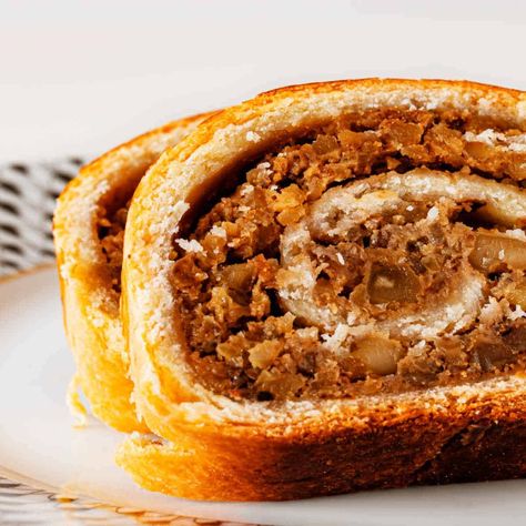 Hungarian Nut Roll (beigli) are sweet yeasted rolls native to Hungary. Filled with a mixture of walnuts or poppy seeds, they're an Easter Walnut Roll, Nut Roll, Best Nut Roll Recipe, Recipe For Nut Roll Filling, Old Fashioned Nut Roll Recipe, Hungarian Nut Roll, Hungarian Nut Roll Recipe, Dough Kneading Machine, Nut Roll Recipe