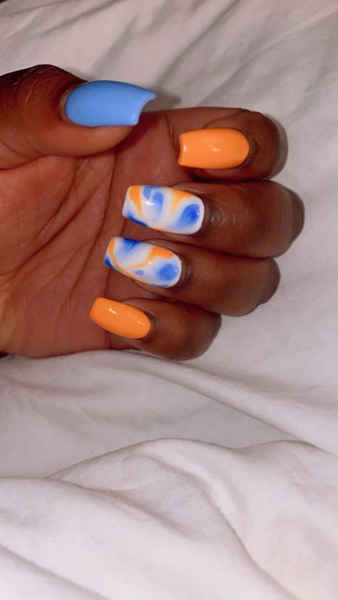 Spring Swirl Nail Designs, Orange Snd Blue Nails, Orange Spring Nails Acrylic, Blue And Orange Gel Nails, Summer Gel Nails Ideas Square, Bright Orange Gel Nails, Blue Spring Nails Acrylic, Blue And Orange Nail Ideas, Royal Blue And Orange Nails