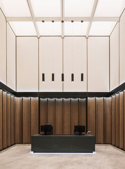 Nulty - Lighting Design Consultants - 80 New Bond Street - Reception Desk Suspended Task Light Integrated Illumination Lighting Scheme, Warm And Cool Colors, London Skyline, Miniature Trees, Task Lighting, Bond Street, Roof Terrace, Quiet Luxury, Reception Desk