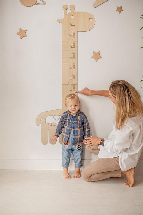 Mark the height chart with a cute giraffe pattern every time you measure your height, and it can be the perfect wall decoration for your kids' room.A child growth chart is made of plywood, safe and non-toxic, waterproof, and durable, so your baby can enjoy healthy and happy growth!Part of the natural beauty of timber is that every piece is different, colours and shades of timber may vary from what is pictured.Please hang the growth chart at 19.06in from the floor to maintain accuracy and facilitate cleaning and prevent accidental kicking. usechatgpt init success