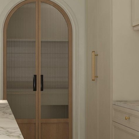 We went through a few designs for this custom door and finally settled on this - an arched pocket door featuring custom stained white oak… | Instagram Arched Pocket Doors Pantry, Stained Pocket Doors, Arch Closet Doors, Fluted Glass Arch Door, Arch Pocket Sliding Door, Reeded Glass Pocket Door, Reeded Glass Pantry Door, Arch Pocket Door, Arched Doors Interior