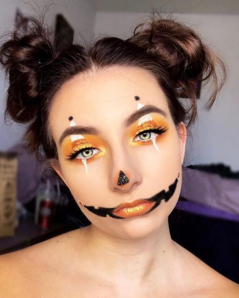 17 Pumpkin Face Paint Ideas You'll Want To Try! - The Mummy Front Pretty Pumpkin Face Makeup, Diy Pumpkin Face Makeup, Pretty Pumpkin Makeup Halloween, Pumkin Makeup Cute, Pumpkin Face Paint Women, Halloween Pumpkin Makeup Looks, Jackolantern Makeup Easy, Pumpkin Skeleton Makeup, Pumpkin Make Up Halloween