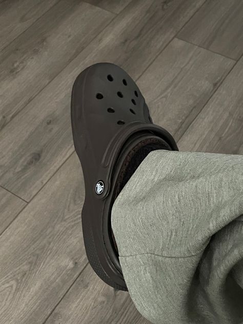 crocs, faux fur crocs, sage green flares Grey Crocs Aesthetic, How To Style Black Crocs, Fur Crocs Outfit, Grey Crocs Outfit, Black Fur Crocs, Black Crocs Aesthetic, Croc Colors, Black Crocs Outfit, Crocs Aesthetic Outfit