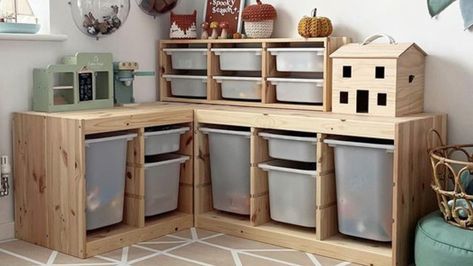 From produce storage to rotating shelves, there's more to IKEA's affordable Trofast line than just toy storage. These DIY hacks are both simple and stylish. Toy Storage Corner Living Room, Ikea Trofast Corner Hack, Trofast Stacked, Trofast Corner, Trofast Hack Playrooms, Corner Toy Storage, Rotating Shelves, Toy Corner, Trofast Ikea