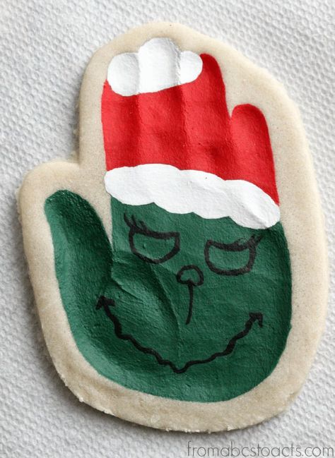 Hand Print Salt Dough Ornament - The Grinch Handprint Salt Dough, Grinch Handprint, Kids Make Christmas Ornaments, The Grinch Hand, Salt Dough Christmas Ornaments, Grinch Crafts, Grinch Hand, Craft Ornaments, Bee Classroom