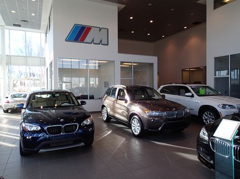 Cain BMW's showroom - Come in and check out our New BMWs! Bmw Showroom, Bmw Dealership, Driving Pictures, Showroom, Bmw Car, New House, Suv Car, Bmw, Road