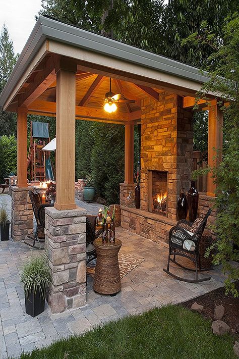 Adding an Outdoor Living Space can turn a view from a window into a main destination for family and friends in the Landscape, under your covered structure, near your outdoor kitchen. Even if an outdoor fireplace is standing alone on your paver patio, or a simple water feature, you will definitely be pulled out from indoor to the outdoor to enjoy the space. Traditional Patio, Indoor Outdoor Fireplaces, Outdoor Covered Patio, Outdoor Fireplace Designs, Outdoor Fireplace Patio, Outdoor Patio Designs, Outdoor Pavilion, Backyard Fireplace, Backyard Gazebo