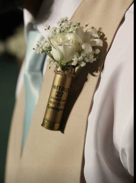 Hit the mark with this shotgun shell boutonnière ! Shotgun shell is filled with million star baby's breath a white spray rose and a bloom of stephanotis- a look any outdoors man wouldn't mind wearing ! Western Style Boutonniere, Country Wedding Boutonniere, Shotgun Wedding Ideas, Shotgun Shell Boutonniere Diy, White Spray Rose, Flowers At Wedding, Outdoors Man, Outdoors Quotes, White Spray Roses