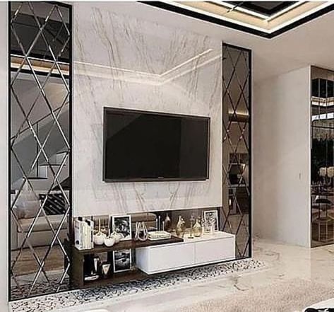 Tv Wall Design Mirror, Tv Wall Mirror Design, Mirror Panel Wall Interior Design Living Room, Tv Unit Design With Mirror, Tv Wall With Mirror Ideas, Mirror In Tv Unit, Tv Unit Mirror Design, Mirrored Tv Wall, Mirror And Tv On Same Wall