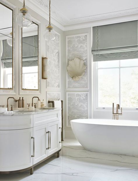 The master bathroom in this London Chelsea Residence , featuring this gorgeous large white bathtub with brass detailing paired with his and her sinks & mirrors. Click to view the entire interior design project. Bathroom Paneling, Serene Bathroom, Townhouse Designs, Chelsea House, Luxury Suite, Bathroom Spa, Interior Architect, Bathroom Designs, Luxury Bath