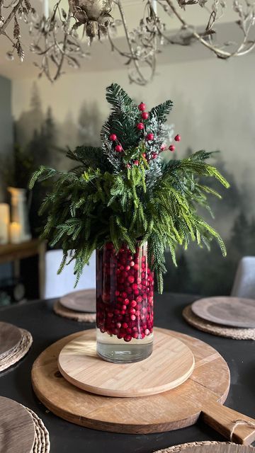 Jodie Kammerer on Instagram: "Comment for links! Who’s getting excited for the holidays? 🙋‍♀️🎄 Comment for links and I can send you the direct Amazon links for: - the pine branches I used - this exact vase! (So versatile!) - these faux Christmas tree candles I used fresh cranberries but you could also use faux. Follow along for more east holiday decorating ideas! 🎄Be sure to follow my Amazon shop (link in bio) 🙋‍♀️ #christmasdecor #easychristmasdiy #christmascenterpiece #christmasdecorati Pine And Cranberry Centerpieces, Centerpiece With Cranberries, Cranberry Vase Centerpiece, Cranberry Decor Christmas, Decorating With Cranberries, Fresh Christmas Centerpieces, Cranberry Decorations, Cranberries Decor, Cranberry Centerpiece