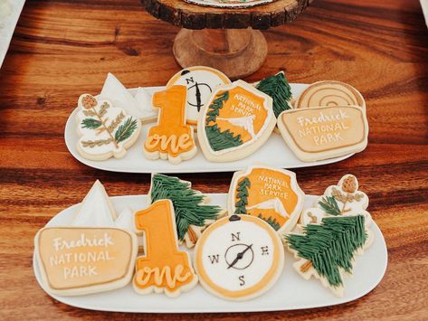 National Park Birthday Cookies, National Park Cake Ideas, National Park 1st Birthday Party, Camping Birthday Cookies, National Park 1st Birthday, National Park First Birthday, National Parks Birthday Theme, National Park Birthday Theme, National Park Cookies