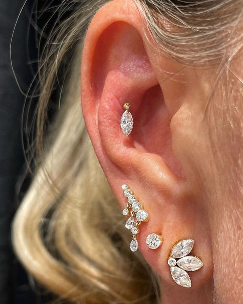 Fresh contraconch for Donna 🔥 We installed the crescendo bar to her lobe and wowzaaaa, love how this filled that space! The floating… | Instagram Contraconch Piercings, Athletic Sets, Snowflake Tattoo, Snow Flake Tattoo, Piercing Inspo, Maria Tash, Cool Piercings, Cartilage Earring, Stacked Jewelry