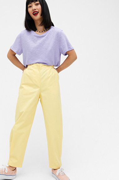 Tapered trousers - Pale yellow - Trousers & shorts - Monki NL Yellow Trousers Outfit, Yellow Top Outfit, Yellow Pants Outfit, Royal Blue Outfits, Women Trousers Design, Yellow Jeans, Trouser Outfit, Orange Outfit, Pastel Outfit