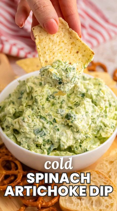 Cold Spinach Artichoke dip is an easy to make and tasty party appetizer. Serve this cold dip with crackers, tortilla chips, or sliced baguette. Cold Spinach Artichoke Dip Recipe, Cold Artichoke Dip, Cold Dips For Party Appetizers, Cold Spinach Artichoke Dip, Spinach Dip Recipe Easy, Tortilla Chip Dip, Cold Spinach Dip, Artichoke Dip Recipe Easy, Dip With Crackers