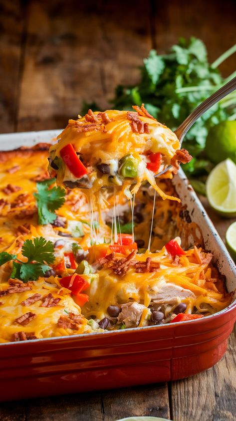 Steamy Southwest chicken casserole on rustic table with bell peppers, cheese, corn, black beans, and cilantro garnish Southwestern Chicken Bowl, Mexican Chicken Casseroles, Mexican Casserole Chicken, Johnny Marzetti Casserole Recipe, Spicy Southwest Chicken, Southwest Casserole, Southwest Chicken Casserole, Southwestern Chicken Casserole, Steak Chili Recipe