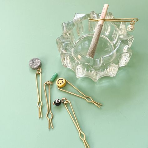 Your smoke break just got a little more charming. These r o a c h clips by @harpdesigns are just the dainty, dangly thing your stash bag needs Available online and in the shop now😉 Ouid Aesthetic, Space Cowgirl, Paris Inspired, Bongos, Herbal Essences, Retail Experience, Puff And Pass, Shopping Spree, Harp