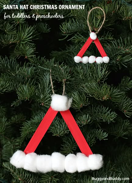 Perfect Christmas craft for toddlers and preschoolers using popsicle sticks and cotton balls! (Santa Hat Homemade Christmas Ornament)~ BuggyandBuddy.com Christmas Crafts For Toddlers, Santa Crafts, Preschool Christmas Crafts, Christmas Kindergarten, Christmas School, Christmas Tree Crafts, Preschool Christmas, Christmas Classroom, Easy Christmas Crafts