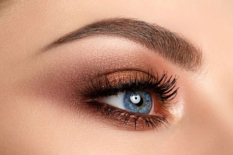 5 Best Eyeshadow Colors If You Have Blue Eyes— Best Life Brown Makeup Blue Eyes, Bronze Eye Makeup Blue Eyes, Blue Gray Eyes Makeup, Eye Shadow For Blue Eyes And Brown Hair, What Color Eyeshadow For Blue Eyes, Simple Eye Makeup For Blue Eyes, Blue Hooded Eyes Makeup, Sultry Makeup For Blue Eyes, Formal Makeup For Blue Eyes