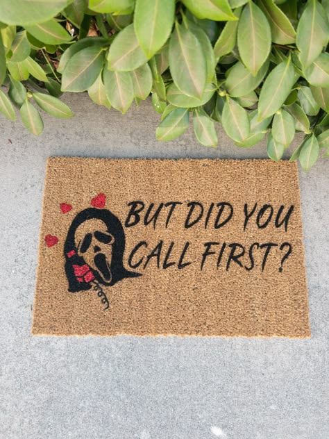 Ghostface Doormat | Scream Halloween Doormat Our mats are made of 100% natural coir material with PVC slip resistant rubber backing. Natural surface provides durability and traction to wipe your shoes. Suitable for indoor and outdoor use. All of our designs are hand-painted made with love just for you. Did You Call First Doormat, Funny Front Door Mats, Door Mats Ideas, Halloween Doormat, Scream Halloween, Movie Decor, Funny Home Decor, Halloween Door Mat, Horror Decor