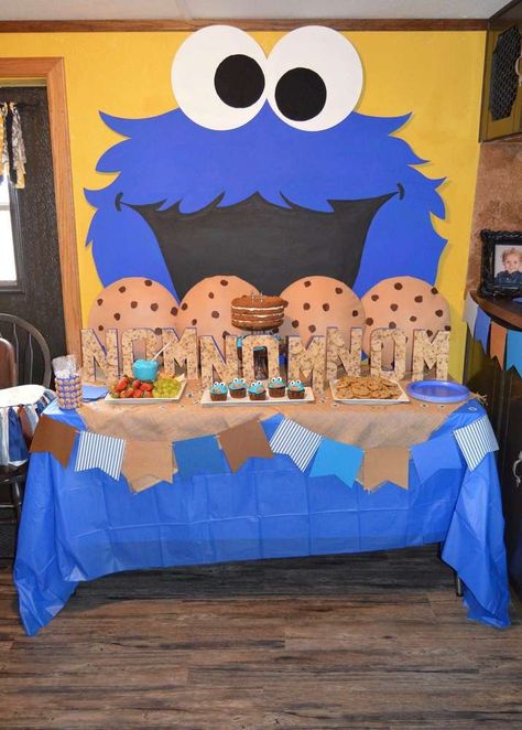 Cookie Monster 2nd Birthday Bash! | CatchMyParty.com Cookie Monster Decorations Diy, Cookie Monster Birthday Party Decorations, Diy Cookie Monster Decorations, Cookie Monster Decor, Cookie Monster Backdrop, Cookie Monster Decorations, Cookie Monster 2nd Birthday, Cookie Monster Drawing, Cookie Monster First Birthday