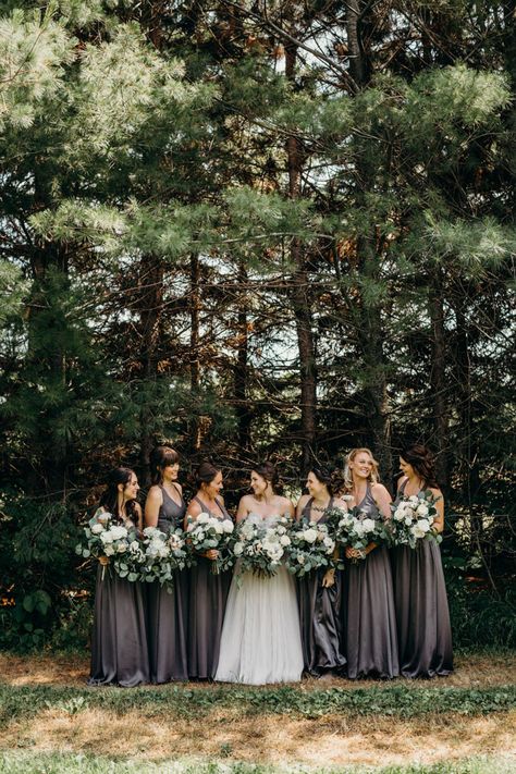 Dark gray bridesmaids dresses with earthy cream + peach bouquets | Image by Grace & Gold Studios Steel Gray Wedding Colors, Grey Wedding Bridesmaid Dresses, Pewter Grey Bridesmaid Dress, Gunmetal Grey Bridesmaid Dresses, Dark Gray Wedding Colors, Dark Grey Bridesmaid Dresses Charcoal, Steel Gray Bridesmaid Dresses, Grey And Greenery Wedding, Bridesmaid Dresses Dark Gray