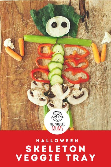 a cute skeleton made from veggies, celery, carrots, bell peppers, cucumber and mushrooms all arranged on a wood tray Skeleton Veggie Tray, Halloween Party Tray, Party Tray Ideas, Veggie Skeleton, Christmas Crock, October Kids, Air Fryer Recipes Appetizers, Party Tray, Easy Halloween Party