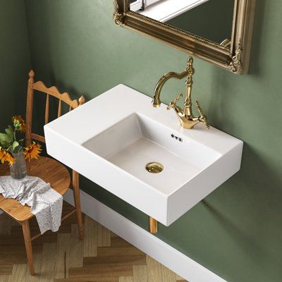 Elevate your bathroom with our exquisite Wall-Hung Sink, a bold statement that complements any setting. Made of high-quality ceramic, this wall-mounted sink bears the excellent quality and durability you can expect from DeerValley. The raised surface adds functionality, allowing you to personalize your space with decor or essentials within easy reach. | DeerValley 23.4" x 16.5" Rectangular Vitreous China Wall Mount Bathroom Sink w / Overflow 5.71 H x 23.43 W x 16.54 D in White | 23.43" L X 16.54 Small Bathroom Sink Shelf, Wall Hanging Bathroom Vanity, Small Wall Hung Vanity, Wall Mounted Sink Bathroom Small Spaces, Exposed Bathroom Plumbing, Freestanding Bathroom Sink, Floating Sink Powder Room, Mounted Sink Bathroom, Floating Sink Bathroom