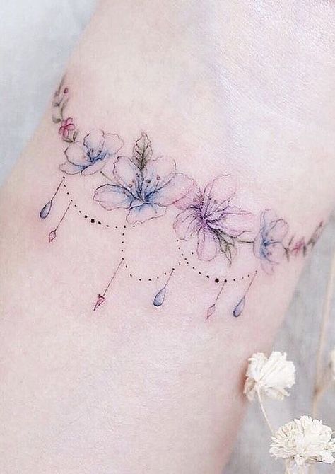 Tattoo Designs For Wrist, Wrist Band Tattoo, Wrist Bracelet Tattoo, Phoenix Tattoos, 16 Tattoo, Flower Wrist Tattoos, Watercolor Tattoo Flower, Armband Tattoo Design, Omerta Tattoo