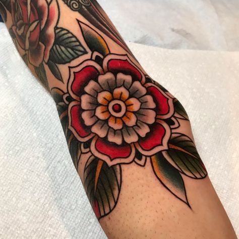 Traditional Flower Tattoo | Color Mandala | American Traditional Tattoo | Colton James Phillips | Gap Filler | Classy Tattoos | Tattoo Patterns | Geometric Flower | Traditional Geometric Tattoo #traditionalflowertattoo Tattoos For Women With Kids, Traditional Tattoo Sleeve Filler, Traditional Mandala Tattoo, Traditional Mandala, Traditional Hand Tattoo, Floral Mandala Tattoo, Mandala Flower Tattoos, Traditional Tattoo Inspiration, Traditional Tattoo Flowers