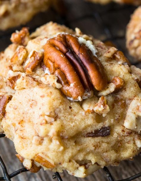 Melt in your mouth butter pecan cookies are the perfect addition to your holiday dessert platter. Nutty and buttery, crunchy and chewy, they are so delish! You probably know that butter pecan cookies are famous for their delicate nutty buttery flavor. What you may not know is that they feature prominently in traditional holiday poetry! It’s two weeks before Christmas, and all through the house, the cook is a-scurrying, with flour on her blouse! The cookies are set on the window to cool, in ... Desserts With Pecans, Holiday Dessert Platter, Easy Holiday Desserts, Butter Pecan Cookies, Dessert Platter, Roasted Pecans, Pecan Cookies, Holiday Dessert, Butter Pecan