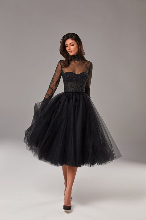 Gorgeous combination midi tulle black dress features a semi-transparent corset bustier and puffy midi skirt. Complemented with a semi-transparent glitter overlay turtleneck blouse, which gives your look additional sparkle. The semi-transparent corset has built-in cups and a zipper closure. Knee-length skirt made of lay Wednesday Addams Family, A Line Cocktail Dress, Vintage Black Dress, Cocktail Dress Vintage, Dress Homecoming, Mini Party, Midi Dress Party, Vestidos Vintage, Black Wedding Dresses