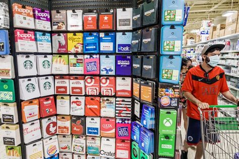 Gift Card Scam: Don't Buy From The Front Of A Store Display Rack | HuffPost Life Walmart Card, Gift Card Displays, Xbox Gift Card, Google Play Gift Card, Itunes Gift Cards, Walmart Gift Cards, Types Of Gifts, Amazon Gift Card Free, Gift Card Generator