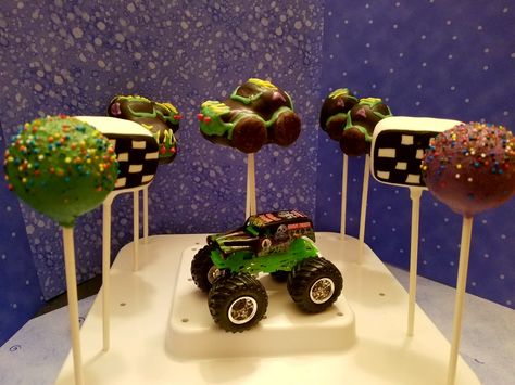 Grave Digger Monster Truck Cake Pops The Cake Pop Fairies I used mini peppermint patties for the tires. I shaped the truck by hand. The checkered flags were painted on using Poppy Paints.    #THECAKEPOPFAIRIES Grave Digger Cake Pops, Monster Truck Cake Pops, Truck Cake Pops, Grave Digger Cake, Monster Jam Cake, Grave Digger Monster Truck, Digger Cake, Monster Truck Cake, Truck Cake