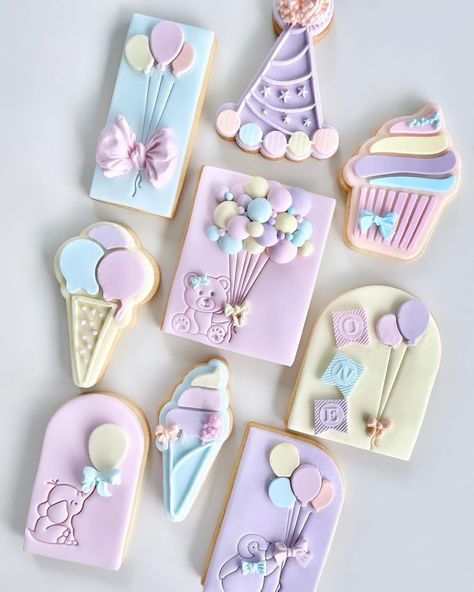 Zoe - The Sugar Co. on Instagram: “The birthday collection 🎈 . . Stamps @iemboss Sprinkles @lurasprinklesandsupplies . . #ballooncookie #pastelcookies #bearcookies…” Fondant Decorated Cookies, Cookies Fondant Decoration, 2 Sweet Cookies Decorated, Fondant Cookies Birthday, Sweet One Sugar Cookies, Cute Birthday Cookies, Fondant Cookies Ideas, Pastel Birthday Cookies Decorated, Baby Girl Sugar Cookies