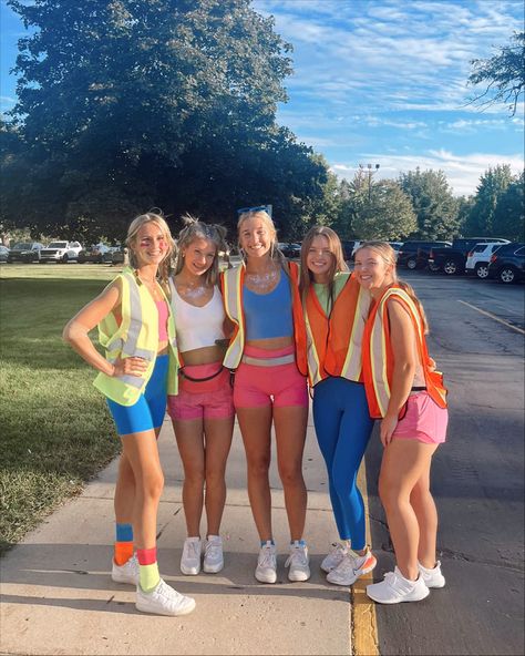 70s Football Game Theme, Neon Inspo Outfits, Neon Orange Shorts Outfit, Construction Outfit Football Game, Neon Outfits Football Game, Team Dress Up Themes, Neon Day Spirit Week Outfit, 70s Spirit Day Outfit, Spirt Week Ideas Outfits