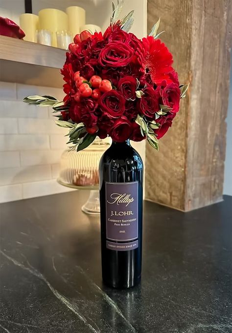 Wine Bottle Bouquet | J. Lohr Flower On Wine Bottle, Wine Bottle Bouquet Gift, Bottle Bouquet Liquor, Flower Wine Bottle Bouquet, Wine Bottle With Flowers On Top, Flower Bottle Bouquet, Wine Bottle Bouquet Diy, Wine Flower Bouquet, Flowers In Wine Bottles