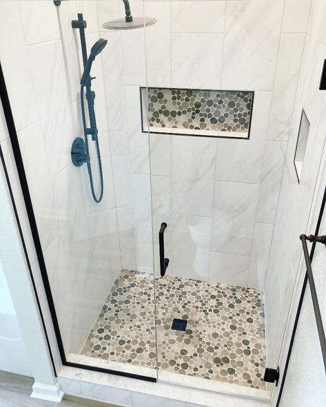 Matte black Schluter profiles and Floral Kerdi-Drain accent this bathroom beautifully. 

Work by Kelsar Remodel LLC. Black Schluter Tile Edge, White Schluter Tile Edge Showers, Shower Threshold Tile Ideas, Shower Tile Transition, Black Schluter Tile Edge Showers, Schluter Tile Edge Showers, Shower Drain Ideas, Schluter Tile Edge, Tile Shower Drain