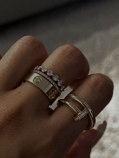 Cartier Love Ring Stacking Ideas, Cartier Love Ring White Gold, Designer Ring Stack, Silver Ring Stack Aesthetic, Cartier Rings Stacked, Cartier Love Ring Silver, Cartier Silver Ring, Ring Stack Cartier, White Gold Ring Stack