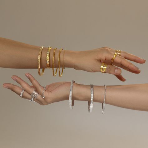 Add a touch of elegance to every occasion with our stunning gold and silver bangles! ✨️ Stack them up for a bold statement or wear them solo for a subtle touch of glamour.  . #jewellerysydney #BangleBeauty #GlamStack #ShineOn #BangleBliss #ChicArmCandy #Silverjewellery #GoldenGleam #goldjewellery #EverydayElegance #jewellerybiz #perfectstack Jewelry Content Ideas, Moodboard Jewelry, Jewelry Shoot Ideas, Jewelry Poses, Trendy Jewelry Ideas, Photographing Jewelry, Jewellery Photography Inspiration, Jewelry Product Shots, Jewelry Store Design